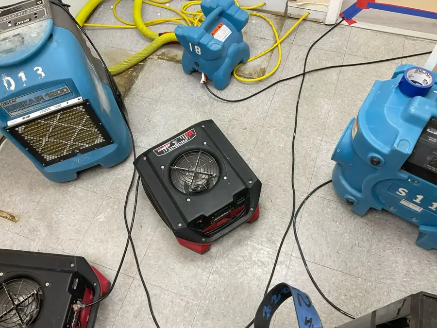 Low-profile air movers set for structural drying in a Hawthorne, CA property