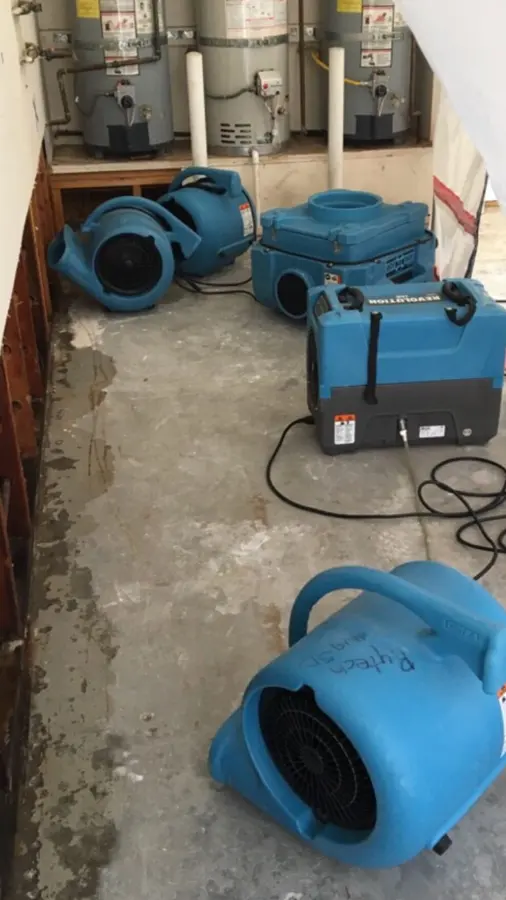 Burst supply line dried in a Hollyglen kitchen in a Hawthorne, CA property
