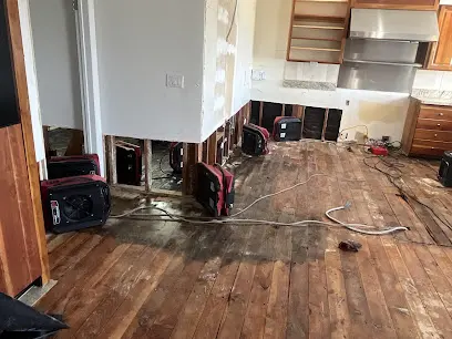 Burst pipe water damage on a buckled floor in Hawthorne, CA